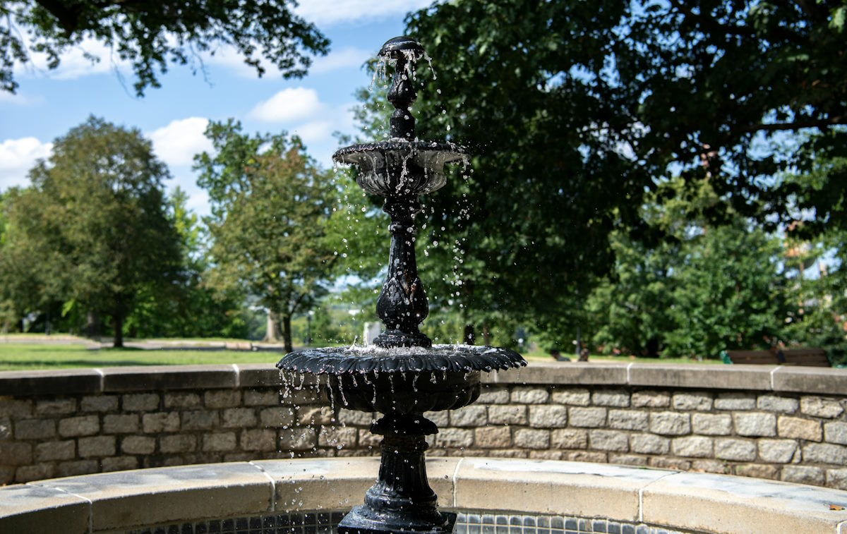 water fountain with rock wall